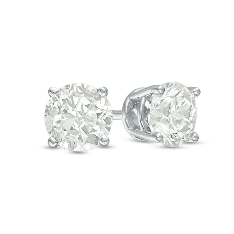 Main Image 1 of Previously Owned - 0.70 CT. T.W. Diamond Solitaire Stud Earrings in 10K White Gold