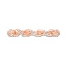 Previously Owned - 0.04 CT. T.W. Diamond Twist Wedding Band in 10K Rose Gold
