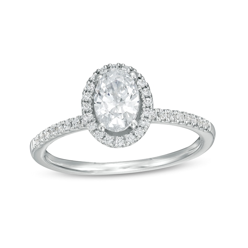 Previously Owned - 0.88 CT. T.W. Oval Diamond Frame Engagement Ring in 14K White Gold