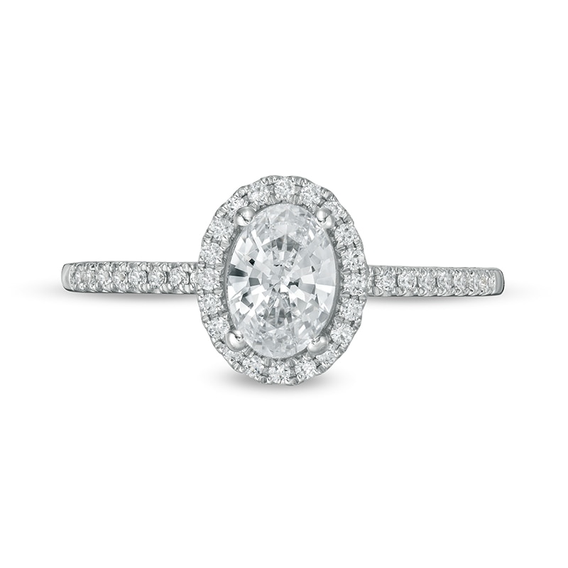 Previously Owned - 0.88 CT. T.W. Oval Diamond Frame Engagement Ring in 14K White Gold