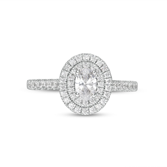 Previously Owned - 0.83 CT. T.W. Oval Diamond Double Frame Engagement Ring in 14K White Gold