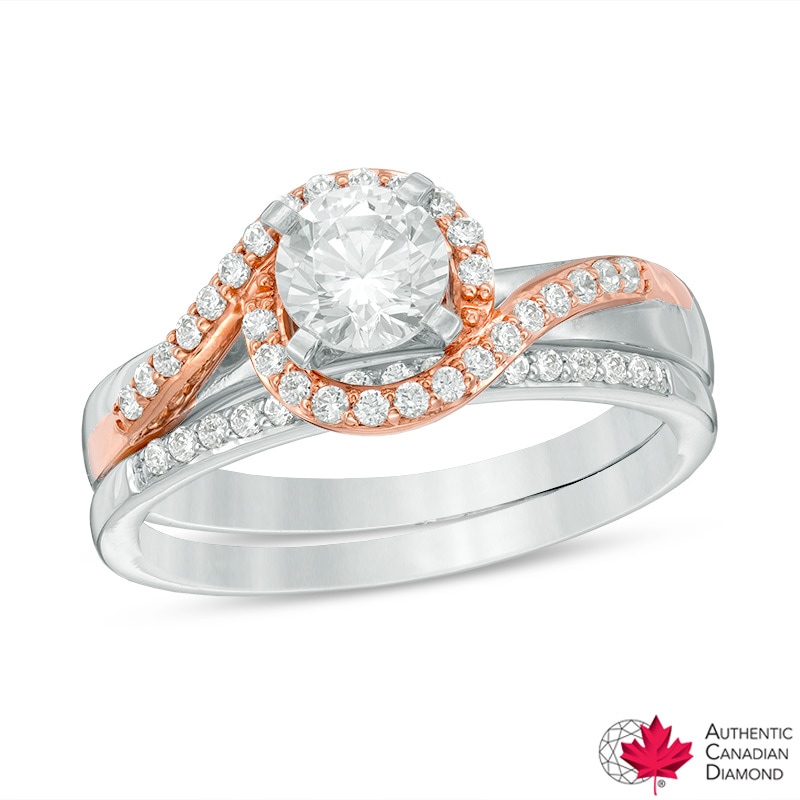 Previously Owned - 0.83 CT. T.W. Certified Canadian Diamond Swirl Bypass Bridal Set in 14K Two-Tone Gold (I/I2)