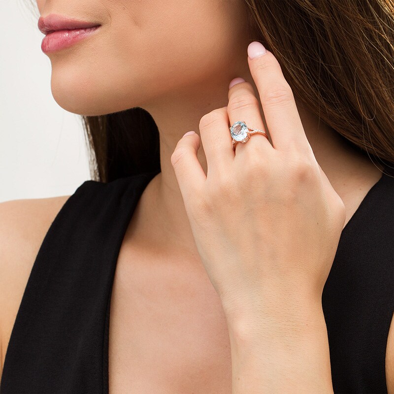 Previously Owned - EFFY™ Collection Oval Aquamarine and 0.19 CT. T.W. Diamond Split Shank Ring in 14K Rose Gold