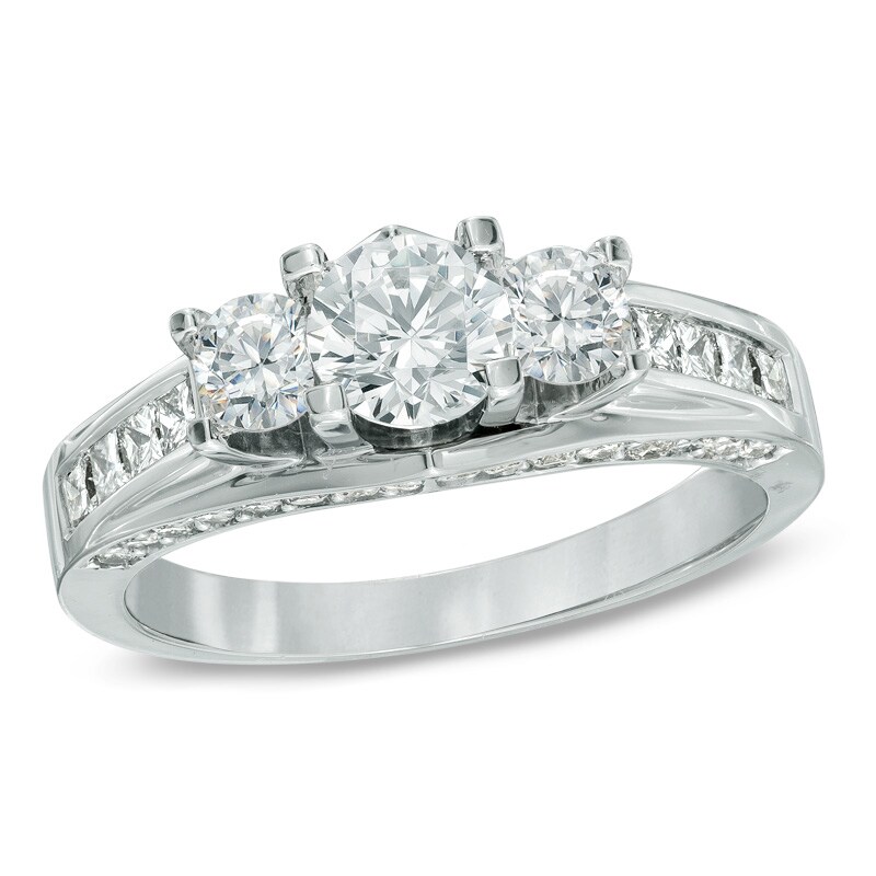 Previously Owned - 1.50 CT. T.W. Canadian Certified Diamond Three Stone Engagement Ring in 14K White Gold (I/I1)