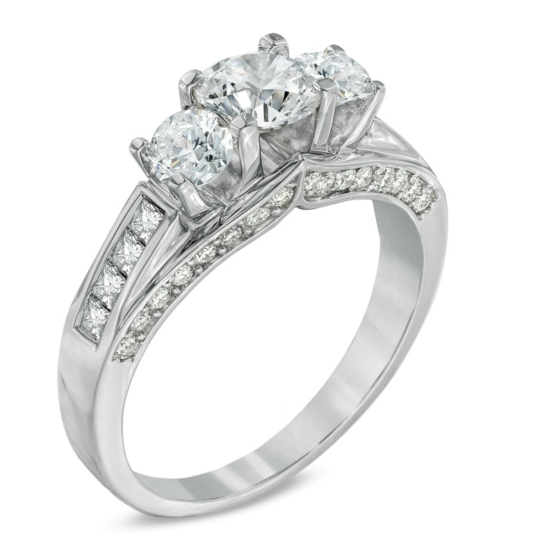 Previously Owned - 1.50 CT. T.W. Canadian Certified Diamond Three Stone Engagement Ring in 14K White Gold (I/I1)