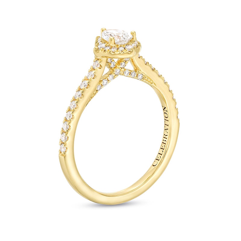 Previously Owned - Celebration Infinite™ Canadian Certified Pear-Shaped Centre Diamond 0.69 CT. T.W. Frame Engagement Ring in 14K Gold