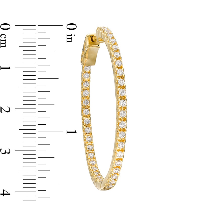 Previously Owned - 1.50 CT. T.W. Diamond Inside-Out Hoop Earrings in 10K Gold