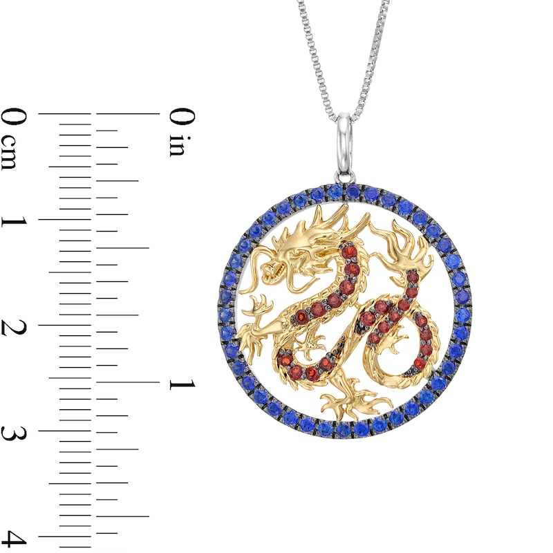 Previously Owned - Garnet and Blue Lab-Created Sapphire Dragon Circle Pendant in Sterling Silver and 10K Gold - 18"