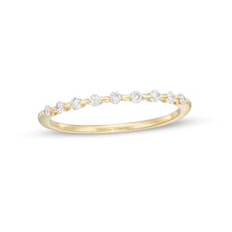 Previously Owned - 0.16 CT. T.W. Diamond Station Stackable Wedding Band in 10K Gold