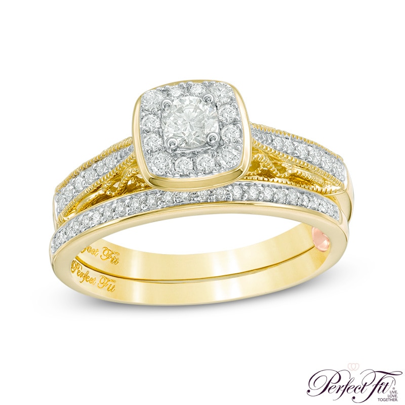 Previously Owned - Perfect Fit 0.45 CT. T.W. Diamond Cushion Frame Vintage-Style Interlocking Bridal Set in 10K Gold