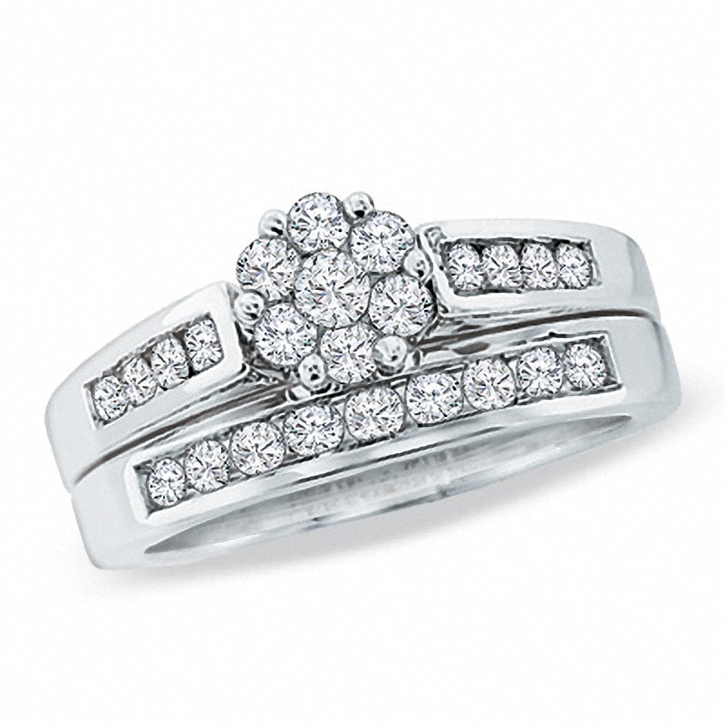 Previously Owned - 1.00 CT. T.W. Composite Diamond Flower Bridal Set in 14K White Gold