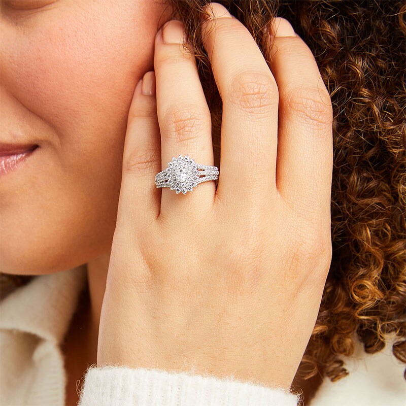 Previously Owned - 0.95 CT. T.W. Oval Diamond Shadow Frame Multi-Row Engagement Ring in 14K White Gold (I/I2)