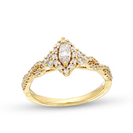 Previously Owned - 0.45 CT. T.W. Marquise Diamond Framed Twist Shank Engagement Ring in 10K Gold (I/I2)