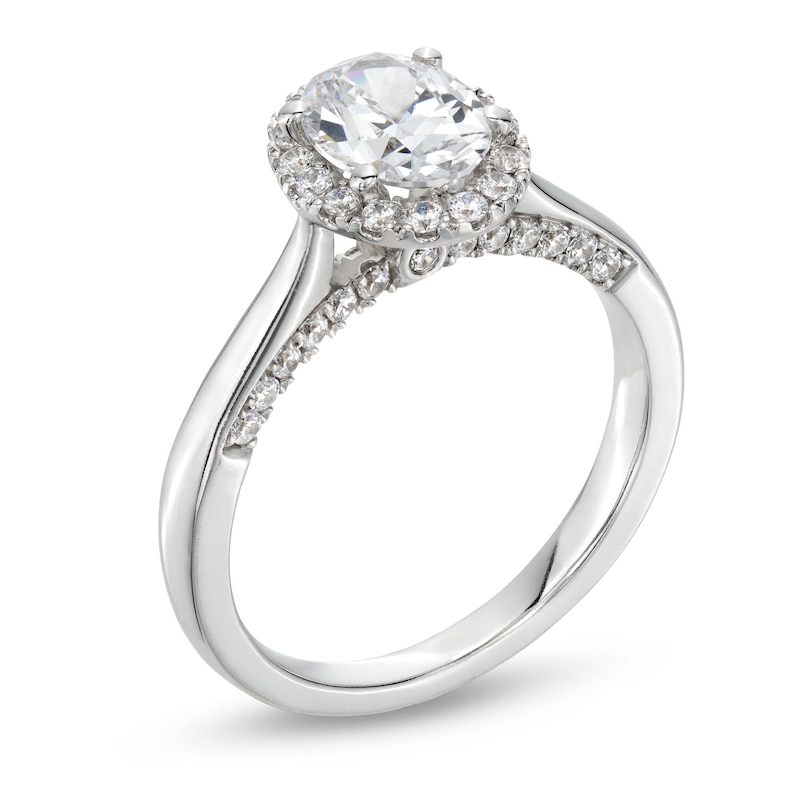 Previously Owned - 1.38 CT. T.W. Oval Certified Lab-Grown Diamond Frame Engagement Ring in 14K White Gold (F/SI2)