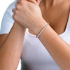 1.00 CT. T.W. Diamond Flower Tennis Bracelet in 10K White Gold