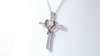 Unstoppable Love™ 0.12 CT. T.W. Diamond Heart Wrapped Cross Pendant in 10K Two-Tone Gold