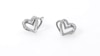 The Kindred Heart from Vera Wang Love Collection 0.09 CT. T.W. Diamond Mini Stud Earrings in Sterling Silver