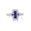 Lab-Created Blue and White Sapphire Linear Three Stone Split Shank Ring in Sterling Silver