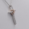 0.085 CT. T.W. Diamond Infinity Heart Cross Pendant in Sterling Silver and 10K Rose Gold