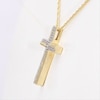 0.117 CT. T.W. Diamond and Textured Cross Pendant in Sterling Silver with 14K Gold Plate