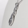 Diamond Accent Twist Flame Pendant in Sterling Silver