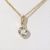 0.23 CT. T.W. Diamond Channel-Set Solitaire Twist Flame Pendant and Stud Earrings Set in 10K Gold