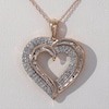 0.45 CT. T.W. Baguette and Round Diamond Heart Pendant in 10K Rose Gold