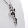 Enhanced Black and White Diamond Accent Twist Ribbon Cross Pendant in Sterling Silver