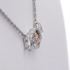 0.086 CT. T.W. Diamond Paw Print and Heart "MOM" Necklace in Sterling Silver and 10K Rose Gold