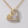 0.065 CT. T.W. Diamond Flower and Heart Outline Pendant in 10K Gold