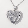 0.065 CT. T.W. Diamond Butterfly Heart Locket in Sterling Silver