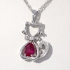 Pear-Shaped Lab-Created Ruby and 0.04 CT. T.W. Diamond Cat with Bow Tie Drop Pendant in Sterling Silver