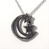 0.115 CT. T.W. Enhanced Black and White Diamond Crescent Moon and Stars Pendant in Sterling Silver with Black Rhodium