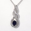 Oval Lab-Created Blue Sapphire and Diamond Accent Cascading Open Flame Pendant in Sterling Silver