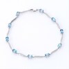 Oval Swiss Blue Topaz and Diamond Accent Wave Link Bracelet in Sterling Silver - 7.25"
