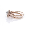 0.95 CT. T.W. Diamond Double Oval Frame Twist Shank Bridal Set in 10K Rose Gold