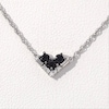 0.23 CT. T.W. Enhanced Black and White Diamond Three Stone Chevron Necklace in Sterling Silver