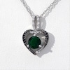 Lab-Created Emerald and 0.065 CT. T.W. Enhanced Black and White Diamond Heart Pendant in Sterling Silver