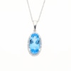 Oval Swiss Blue Topaz and 0.10 CT. T.W. Diamond Frame Pendant in 10K White Gold