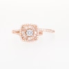 0.95 CT. T.W. Diamond Baguette and Round Double Cushion Frame Split Shank Bridal Set in 10K Rose Gold