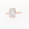 0.95 CT. T.W. Emerald-Shaped Multi-Diamond Bridal Set in 10K Rose Gold