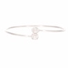 0.25 CT. T.W. Baguette and Oval-Shaped Multi-Diamond Frame Overlapping Bangle in 10K White Gold