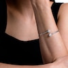 0.20 CT. T.W. Multi-Diamond Double Circle Bypass Flexible Bangle in Sterling Silver