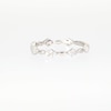 0.23 CT. T.W. Diamond and Oval Bead Alternating Anniversary Band in 10K White Gold