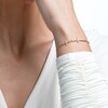 0.23 CT. T.W. Diamond Alternating Infinity Loop Cross Bolo Bracelet in 10K Gold – 10"