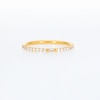 0.18 CT. T.W. Baguette and Round Diamond Anniversary Band in 10K Gold