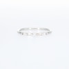 0.07 CT. T.W. Baguette Diamond Three Stone Anniversary Band in 10K Gold