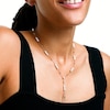 Oval Freshwater Cultured Pearl Cross Station "Y" Necklace in 10K Gold