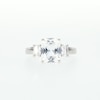 Emerald-Cut White Lab-Created Sapphire Three Stone Ring in Sterling Silver