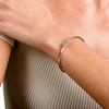 Unstoppable Love™ Diamond Accent Sideways Infinity Symbol Bangle in Sterling Silver